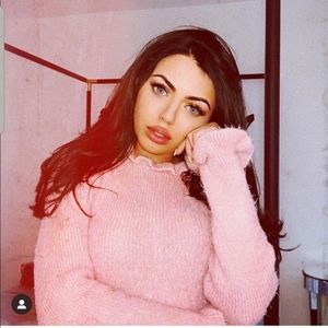 Soft pink ruffled sweater. NWT.